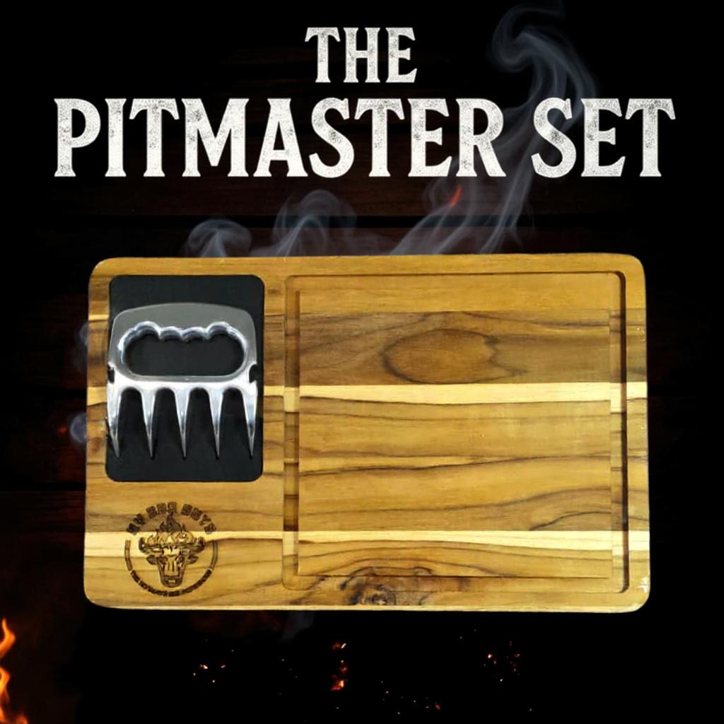 Wooden cutting board with a meat tenderizer on a dark background with smoke and flames.