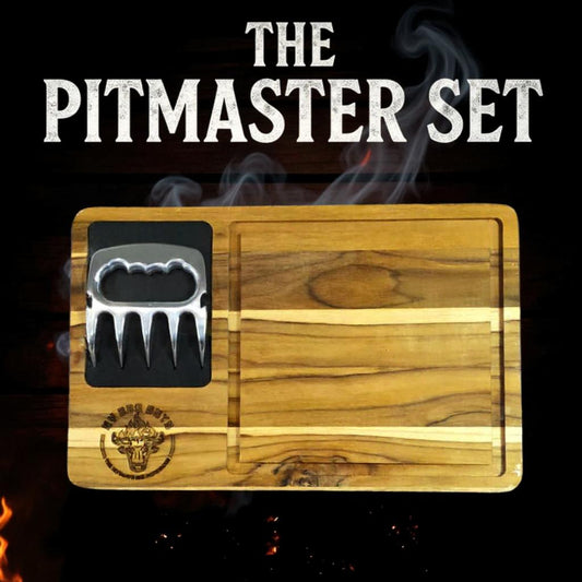 Wooden cutting board with a meat tenderizer on a dark background with smoke and flames.