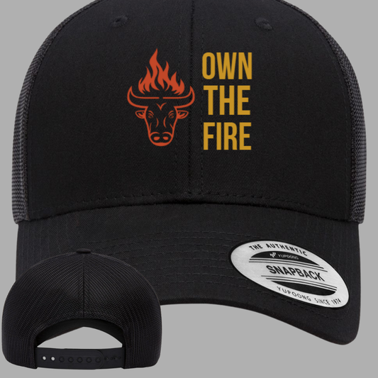 Own The Fire™ Trucker Hat - Black/Gold