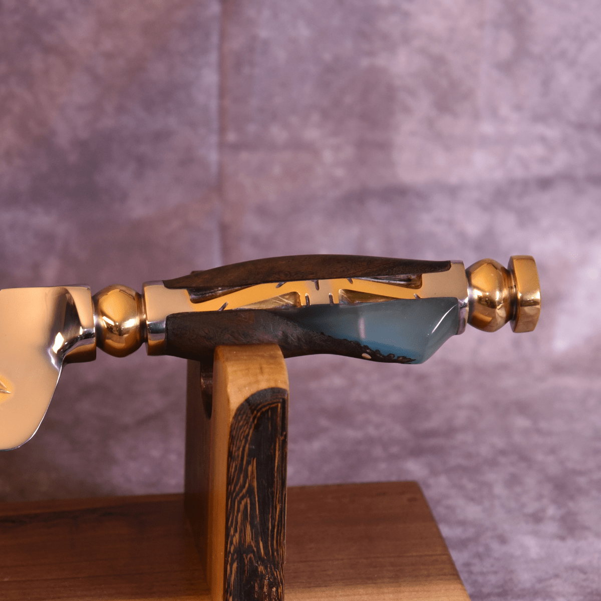 The Shadow Feather — Partial Gold Collector's Blade - OwnTheFire™